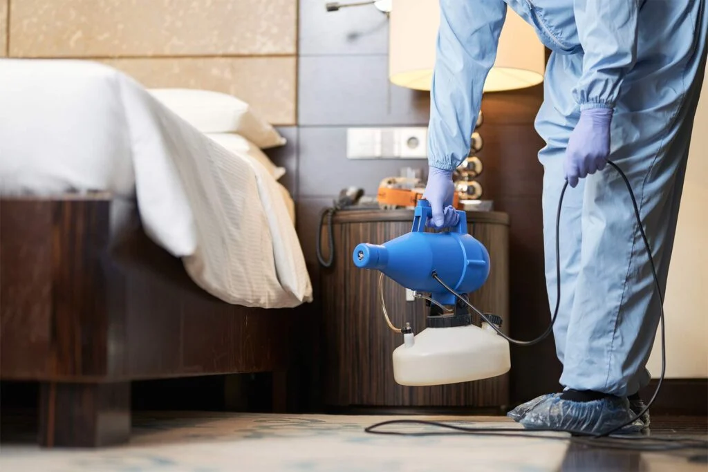 man in protective overalls cleaning the air from v 2025 03 26 12 15 21 LQWMGM6